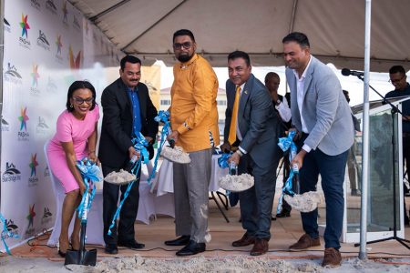 From left: Oneidge Walrond, Minister of Tourism and Commerce; Lalit Sharma; President Irfaan Ali; Peter Ramsaroop and Sanket Balgi, turning the sod for the new Pasha Global Hotel yesterday. (DPI photo). 