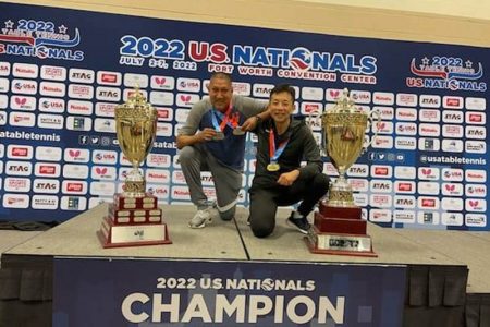  In the picture above David, left and Shao Yu, pose with their respective trophies
