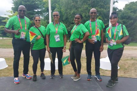 Guyana’s representatives at the welcome country’s welcome ceremony in the Athletes Village. 