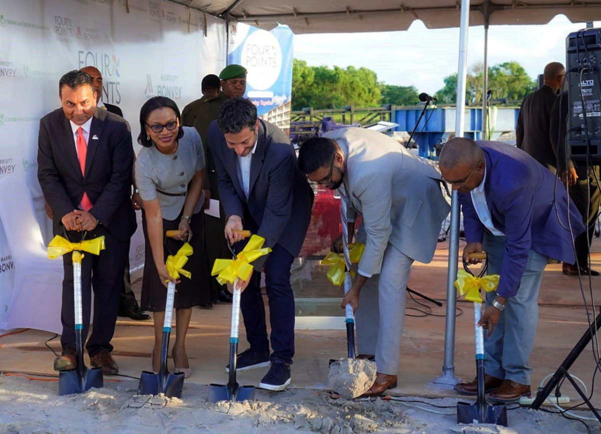 President Irfaan Ali (second from right) along with Andres Botero-Toro (centre), the Minister of Tourism Oneidge Walrond (second from left), and G- Invest CEO Peter Ramsaroop (left) turning the sod for the Four Points by Sheraton Hotel at Houston yesterday. (Office of the President photo)
