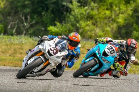 Guyanese, speed demon, Elliott Vieira leading the pack recently in the second round of the Liqui Moly Pro Sport Bike class of the Canadian Superbike Championship (CSBK), held at Calabogie Motorsports Park. (Damian Pereira photo)