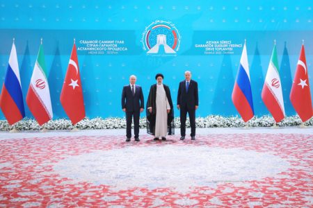 Russian President Vladimir Putin (left), Iranian President Ebrahim Raisi (centre) and Turkish President Tayyip Erdogan pose for a photo before a meeting of leaders from the three guarantor states of the Astana process, designed to find a peace settlement in Syria crisis, in Tehran, Iran July 19, 2022.President Website/WANA (West Asia News Agency)/Handout via REUTERS
