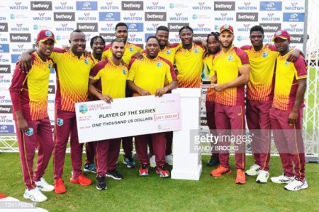 The victorious West Indies outfit pose with their spoils after completing a 2-0 sweep of Bangladesh (Photo compliments of CWI)
