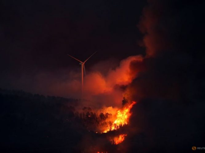 A windmill on fire in Spain (Reuters photo)