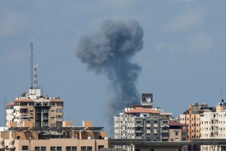 Smoke rises during an Israeli air strike, amid Israel-Gaza fighting, in Gaza City August 6, 2022. REUTERS/Ibraheem Abu Mustafa