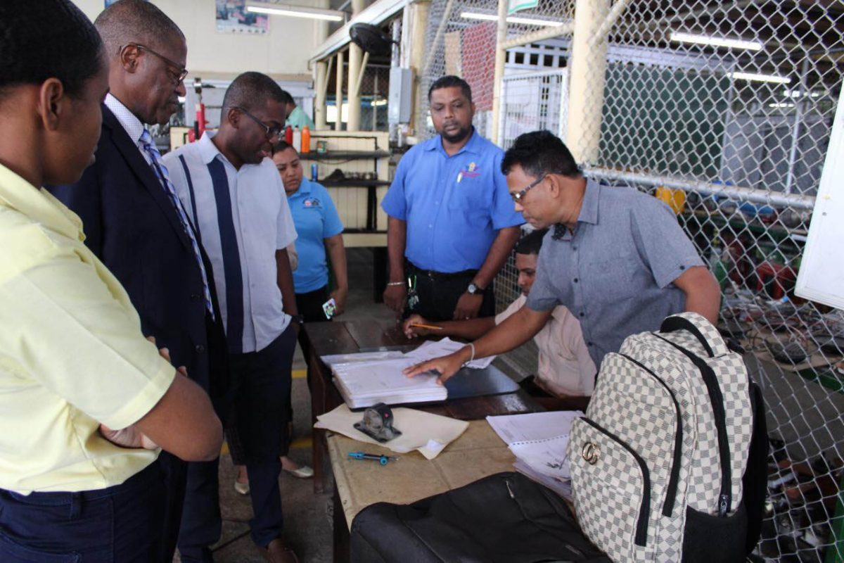  Dr Hassan Ndahi, ILO Senior Specialist, Skills & Employability (second from left) during a site visit with Chief Executive Officer of BIT,
Mr Richard Maughn (third from left) (Board of Industrial Training Guyana photo) 
