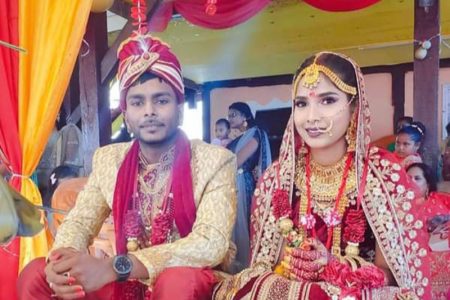 Beeshan Dhoray and his wife Viroshni Persaud at their wedding on Sunday