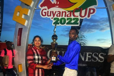 Colin Ross receiving his champion jockey accolade after a brilliant showing in the feature event with Alado to clinch the Guyana Cup

