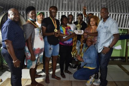 Cobras receiving the championship trophy and first place package from organiser Roderick Harry in the presence of several sponsors inclusive of Dynasty Sports Club, Triple M Investments, Ryan Rambalak and Raphael’s Trading Enterprise.
