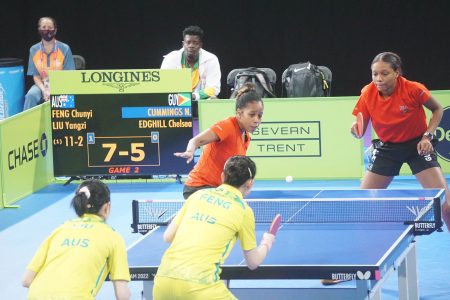 Natalie Cummings (left) in action yesterday during yesterday’s women’s doubles Round of 16 match with Chelsea Edghill. Cummings had a historic run at the Commonwealth Games here in Birmingham, England. She became the first local paddler to qualify for the Round of 16 since tennis was introduced to the Games in 2002. (Emmerson Campbell photo)
