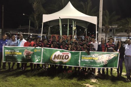 Dynasty! Defending champion Christianburg/Wismar posing with the winner’s trophy after successfully retaining the Milo Secondary School Football Championship