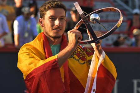 Carreno Busta poses with the championship trophy after defeating Hubert Hurkacz to win the Canadian Masters
