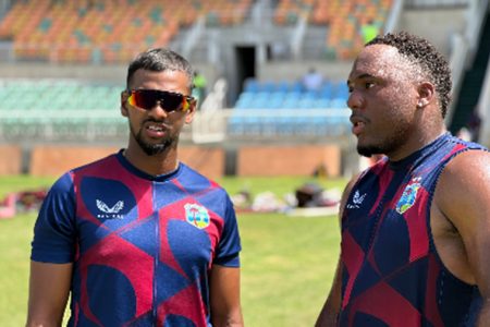 West Indies captain Nicholas Pooran (left) and fast bowler Odean Smith during final practice at Sabina Park. (Photo courtesy CWI Media)