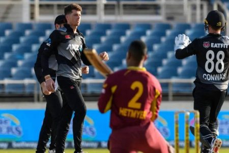 Mitchell Santer (second from left) of New Zealand celebrating the wicket of Shimron Hetmyer for 2 in the 1st T201