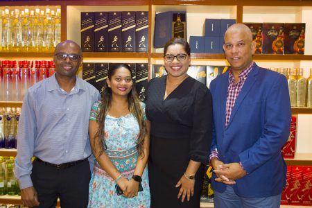 From left are Maxwell Denny (Finance Manager Demico Division),  Devika Singh (Marketing Assistant of MovieTowne Mall)  Cindy Ramnarine (Marketing Manager of Movietowne Mall) and  Carlton Joao (Sales and Marketing Executive Banks DIH Limited).