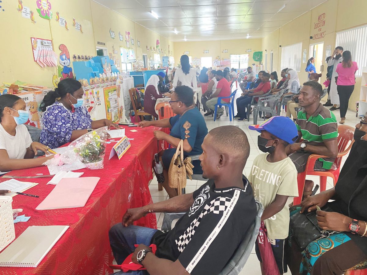 Parents at Cotton Field, Essequibo for the cash grant