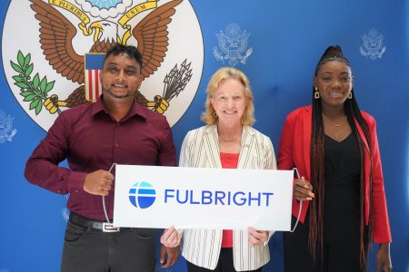 The US Embassy on Friday announced the selection of two Guyanese scholars, educator Keesha St. John and civil engineer Bayeeshmaal Ramsundar, for 2022 Fulbright Scholarship Awards. In photo (from left) are Ramsundar, US Ambassador Sarah-Ann Lynch, and St. John. See story on page 15 (US Embassy photo) 