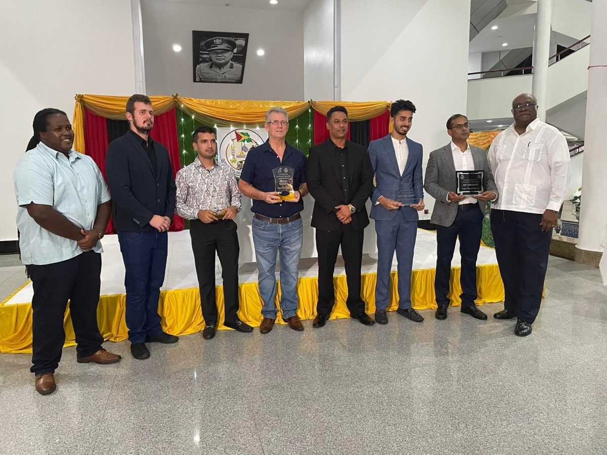 Some of the awardees along with the Ministry of Natural Resources’ Permanent Secretary Joslyn McKenzie (at left), GGMC Board Chairman Jimmy Reece (fourth, from right) and GGMC Commissioner Newell Dennison (at right) 