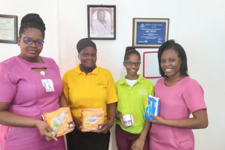 Hospital staff with some of the donations