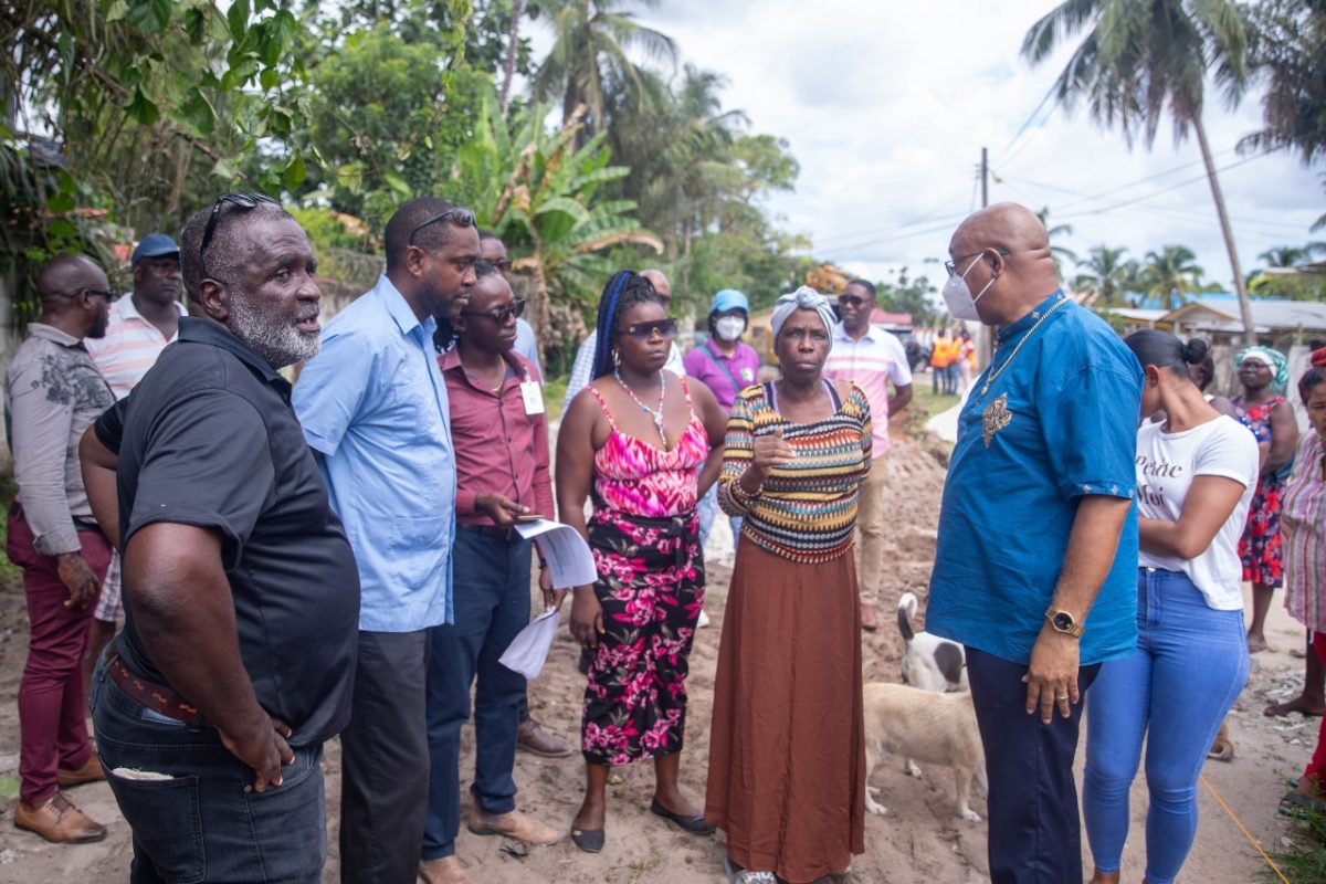 Minister pf Public Works Juan Edghill (right) meeting with Linden residents (Ministry of Public Works photo) 
