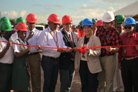 Officials cutting the ribbon to commission the solar farm on Friday (DPI photo)

