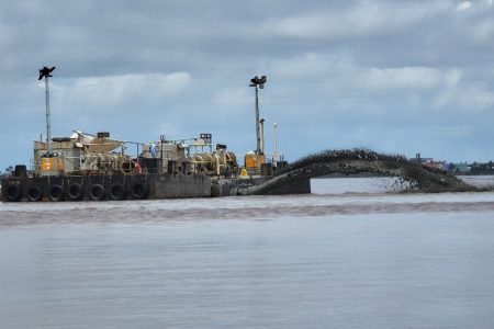 Mud being discarded by one of the dredges in the ocean