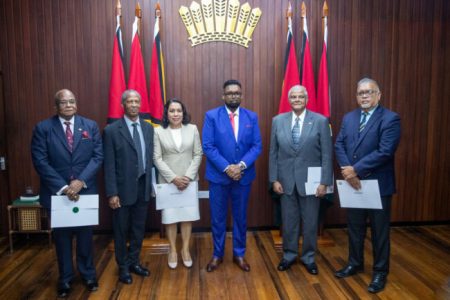 From left are Dunstan Barrow, Compton Bourne, Carolyn Rodrigues-Birkett, President Irfaan Ali, Major General (Ret’d) Joe Singh and Ramesh Dookhoo. (Department of Public Information photo)
