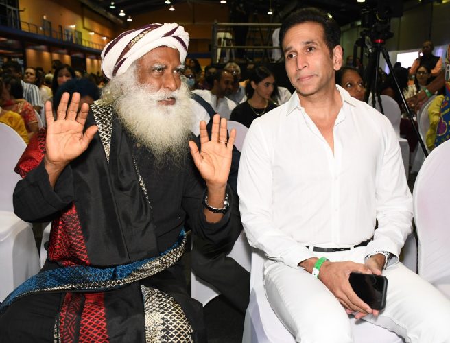 Sadhguru speaks with Local Government Minister Faris Al-Rawi at An Evening with Sadhguru at the Centre of Excellence, Macoya, on Wednesday.