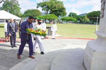 Paying tribute: President Irfaan Ali about to place a ceremonial wreath at the Cenotaph Monument in Port of Spain, Trinidad and Tobago on Thursday morning. The Office of the President said Ali, who is on a state visit to the Twin Island Republic, was received at the entrance of Memorial Park by Trinidad’s Minister of National Security, Fitzgerald Hinds, Mayor of Port of Spain Joel Martinez and the Chief of Staff of the Trinidad and Tobago Defence Force Brigadier Dexter Francis. The cenotaph honours Trinidad and Tobago nationals who lost their lives in the first and second world wars. (Office of the President photo)  