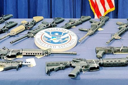 Weapons seized by U.S. authorities that had been destined for illegal export to Haiti are displayed during a news conference in Miami, Florida, U.S. August 17, 2022. REUTERS/Brian Ellsworth