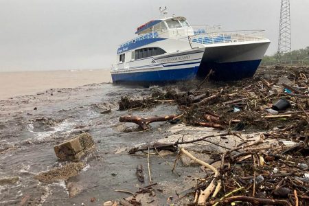 A boat lies washed up on shore after the passing of Hurricane Fiona in Ponce, Puerto Rico September 19, 2022. REUTERS/Ricardo Ortiz