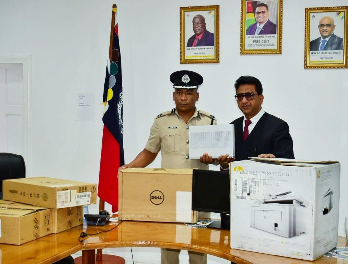 Attorney General, Anil Nandlall (right) handed over the equipment to Deputy Commissioner ‘Administration’ (ag) Calvin Brutus on Monday. (Photo taken from the AG’s Facebook page)

