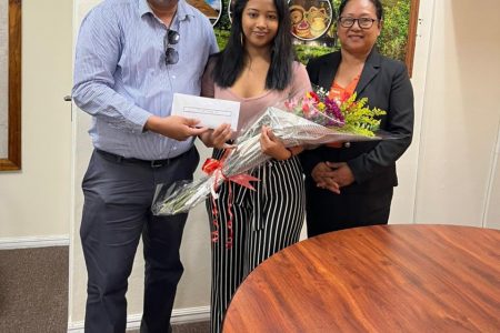 Minister of Amerindian Affairs Pauline Sukhai on Wednesday offered an in-person apology to Amber Andrews, the pageant contestant who was wrongfully crowned Miss Amerindian Heritage. In a brief statement posted on its Facebook page, the ministry stated that Andrews met with Sukhai, and Permanent Secretary Ryan Toolsiram in the company of her father, on Wednesday. The post stated that the ministry looks forward to working with the beauty queen, who represented Region Five, as an Amerindian Women Youth Ambassador to empower young women and girls in Indigenous Communities across Guyana. Meanwhile, Kristie Emma Rambharat, the official winner, has officially received her crown. The Ministry was forced to issue a full apology to all delegates due to the controversy over erroneous tallying, which it said led to the wrong person being declared queen on the night of the pageant. In a statement before the apology was issued by the ministry, Andrews had said that she was publicly humiliated and even cyber-bullied, not only by the audience, but also by the judges and other pageant personnel. As a result, she expressed her discontent with the ministry not issuing an apology to her in its initial release explaining the results or through any other medium. In photo, Andrews stands with Permanent Secretary Ryan Toolsiram (left) and Minister of Amerindian Affairs Sukhai (right) after being issued with an apology at the meeting on Wednesday.  (Ministry of Amerindian Affairs Photo)