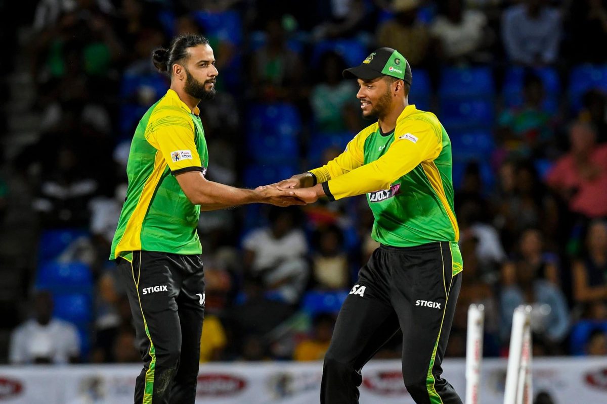 Brandon King (right) and Imad Wasim celebrating a dismissal during their win against the Patriots 