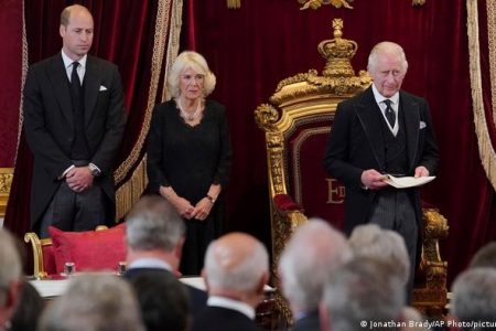 Charles III (r), seen next to his wife, Camilla, and his son, Prince William, spoke of ‘heavy responsibilities’