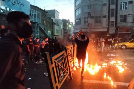 People light a fire during a protest over the death of Mahsa Amini, a woman who died after being arrested by the Islamic republic’s “morality police”, in Tehran, Iran September 21, 2022. Photo: WANA (West Asia News Agency) via REUTERS

