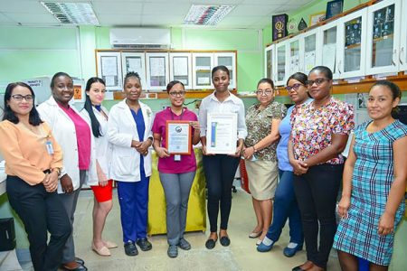  St. Joseph Mercy Hospital Laboratory Staff proudly display the certificate and plaque (GNBS photo) 