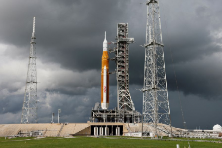 NASA's next-generation moon rocket, the Space Launch System (SLS) with the Orion crew capsule perched on top, stands on launch complex 39B as rain clouds move into the area before its rescheduled debut test launch for the Artemis 1 mission at Cape Canaveral, Florida, US September 2, 2022. PHOTO: REUTERS 