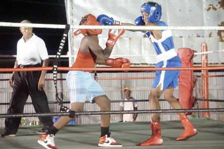 Some of the action at the Guyana Boxing Association youth and junior boxing card at Rose Hall Town last evening. (Emmerson Campbell photo)