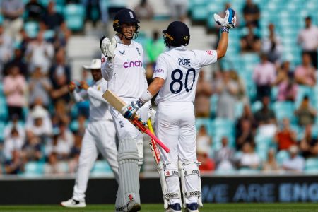  England’s Ollie Pope and Zak Crawley celebrate winning the match and series Action Images via Reuters/Andrew Boyers