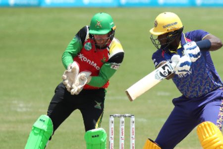 Jason Holder plays through the off side during his unbeaten 40 against Guyana Amazon Warriors. (Photo courtesy Getty/CPL)
