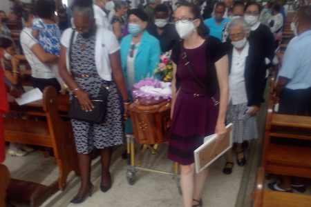 Sister Mary Noel Menezes’ casket being borne from the Cathedral of the Immaculate Conception, Brickdam after her funeral service yesterday.  Sister Mary Noel, a historian and former University of Guyana lecturer,  passed away on August 31st at the age of 92.