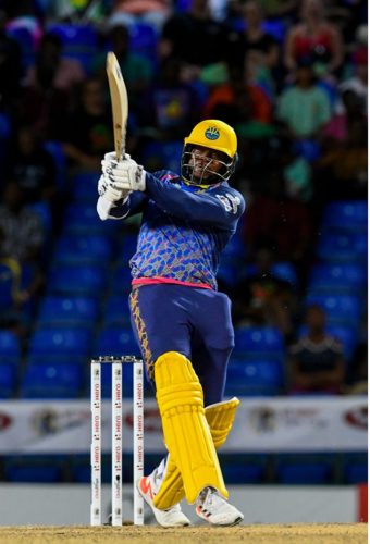  Kyle Mayers goes on the attack during his half-century for Barbados Royals on Thursday. (Photo courtesy Getty/CPL) 