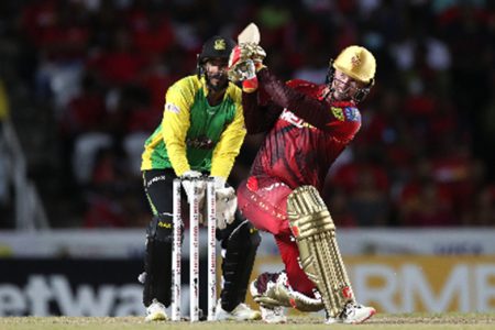 Colin Munro hits out during his crucial 40 for TKR against Tallawahs on Saturday. (Photo courtesy Getty/CPL)