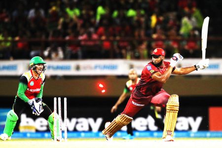 SENT PACKING! Kieron Pollard of the Trinbago Knight Riders is sent packing after being brilliantly stumped by Rahmanullah Gurbaz of the Amazon Warriors during the two teams must-win clash last night at the Providence National Stadium. (Photo by Ashley Allen-CPLT20/CPLT20 via Getty Images).
