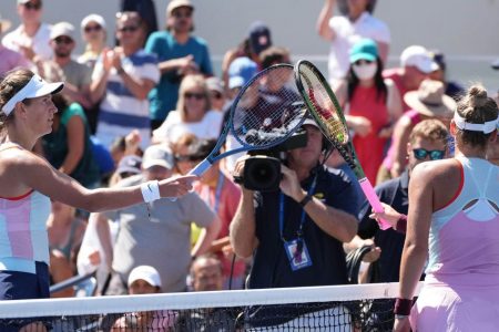 RACQUETSHAKE? Ukraine’s Marta Kostyuk and Victoria Azarenka of Belarus touching racquets instead of shaking hands following their US Open tennis match yesterday. (Reuters photo)
