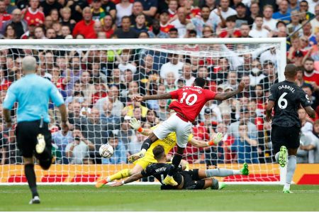 Manchester United’s Marcus Rashford scores their second goal REUTERS/Craig Brough