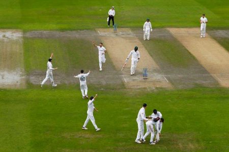 England’s James Anderson celebrate with teammates taking the wicket of South Africa’s Kagiso Rabada Action Images via Reuters/Jason Cairnduff