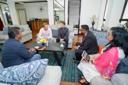 President Irfaan Ali (second from right) meeting with the team. (Office of the President photo)