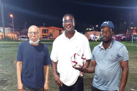 In the picture above Shaun Thompson, with the ball, is flanked by Allan Walker, left and Roger Moe. 